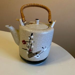 Asian style pottery tea pot.